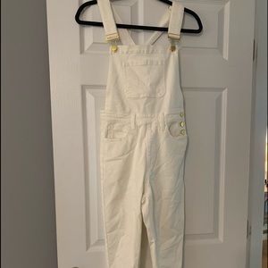 Brand new high rise skinny overalls. Never worn